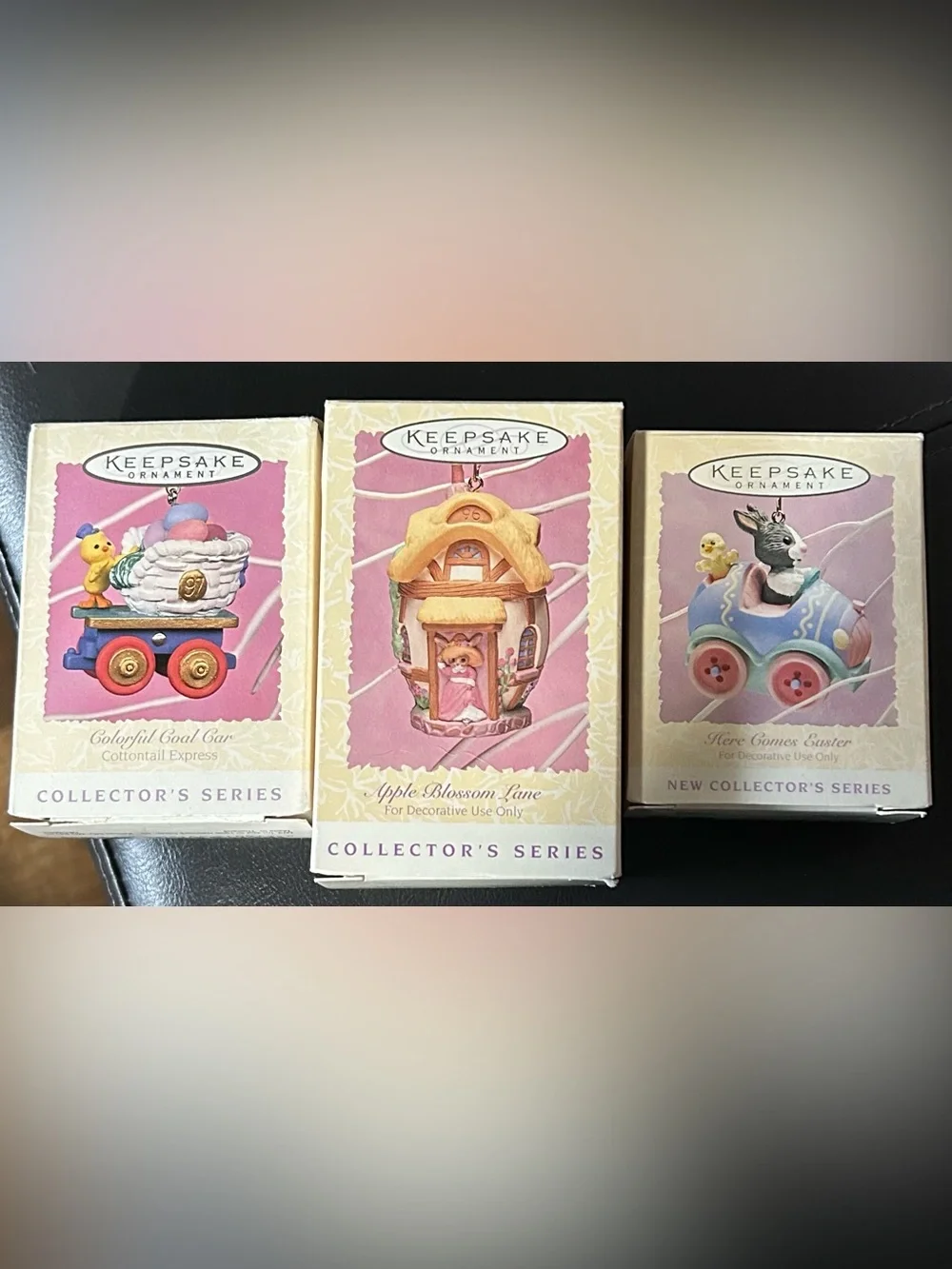 3- Hallmark,ornaments.Coal car 1997, Apple Blossom 1996, Here comes Easter 1994